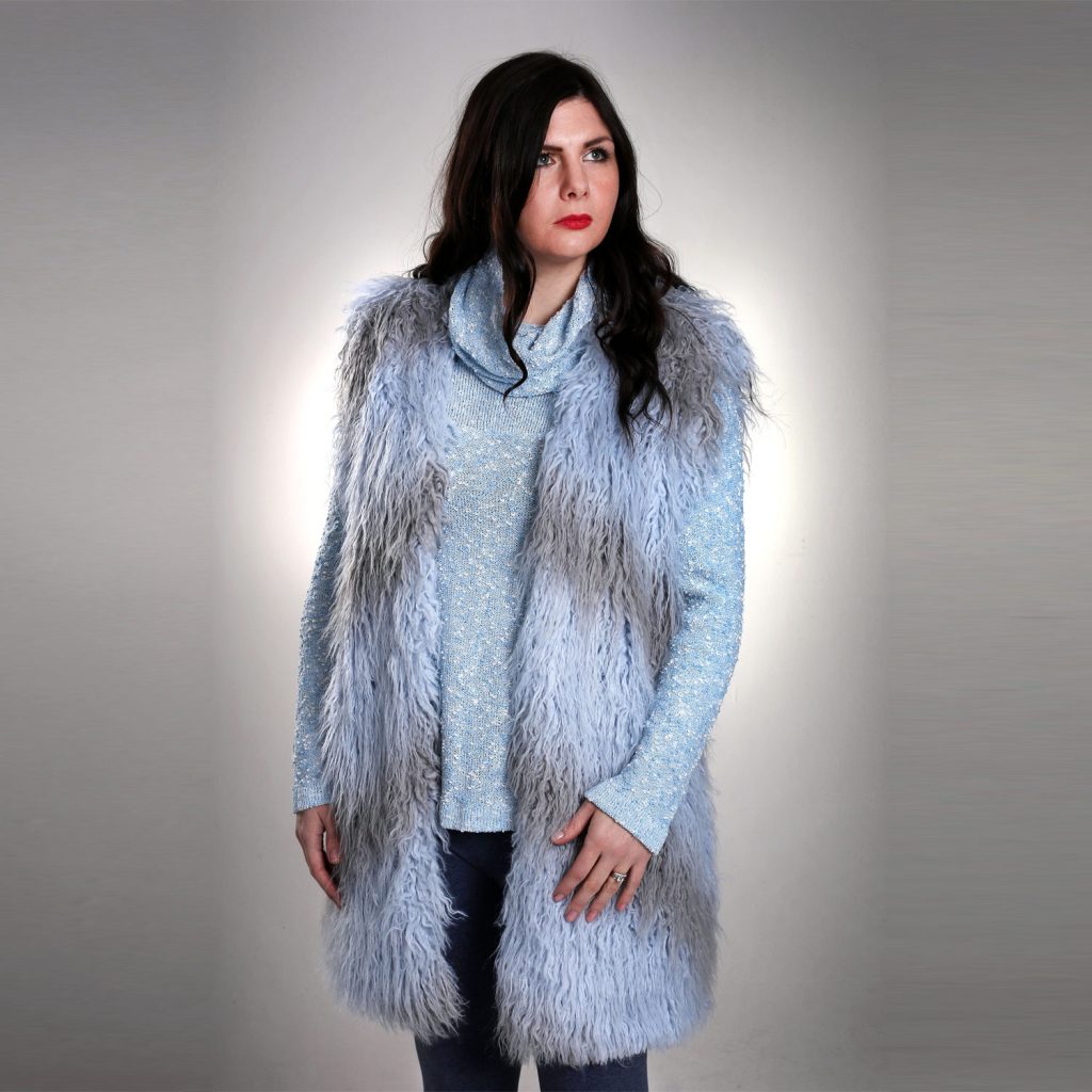A perfect accessory garment, this eco fur vest helps you to create wonderful layered looks with other garments. Try it with one of our blouses, or the cowl neck top to see how the vest transforms your look. Try it teamed with leggings for slouchy fun, or with jeans, either with or without a blouse. Skinny jeans and this eco fur vest make a complete statement outfit that you will be completely delighted with.

Model wears size M